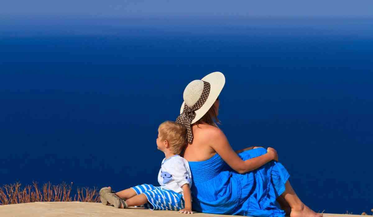 Happy family on vacation exploring a beach